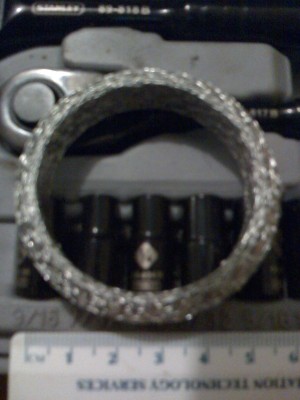 metal ring from head gasket kit.jpg